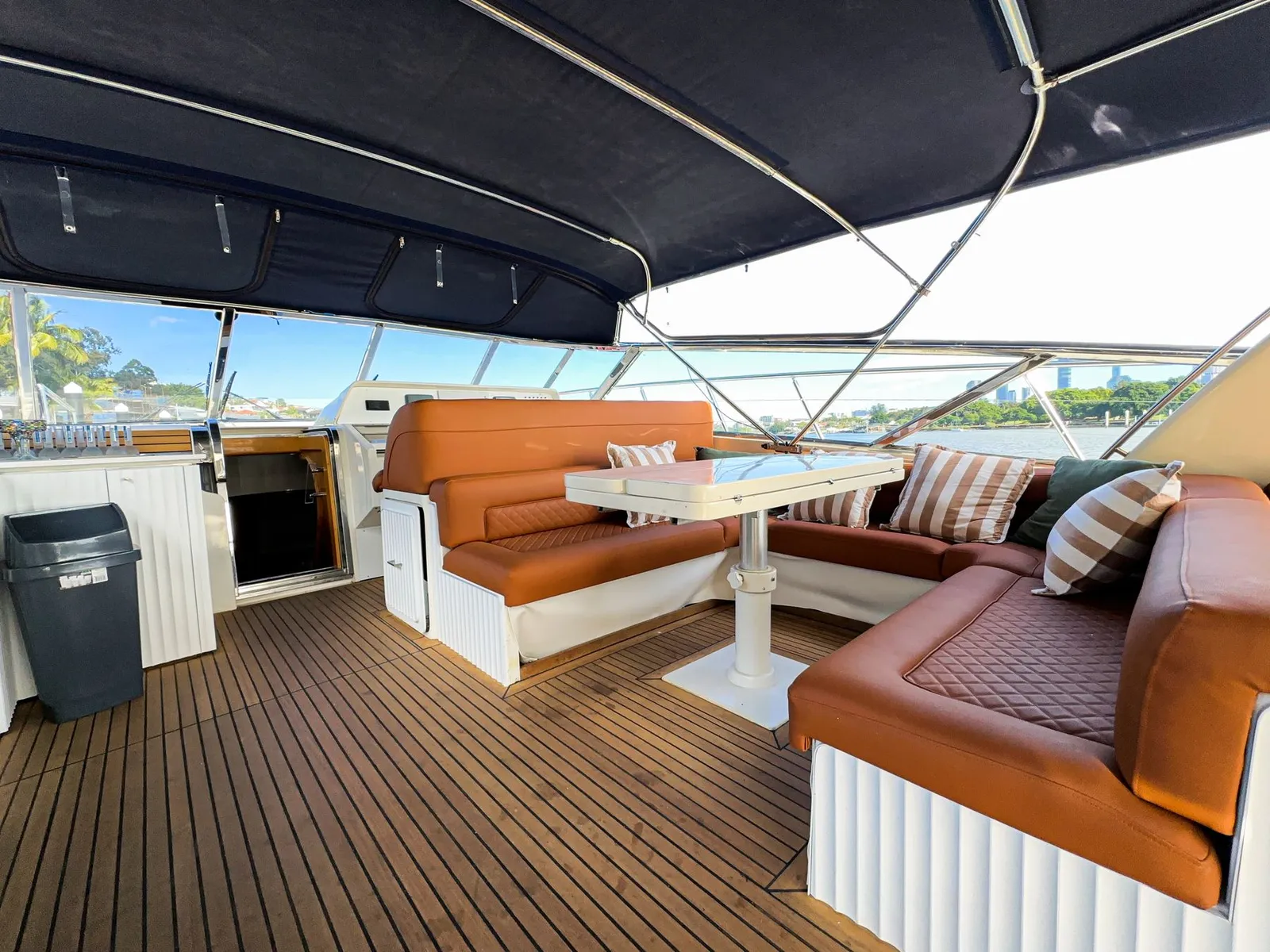 Deck dining lounge on board the Bote Charters yacht