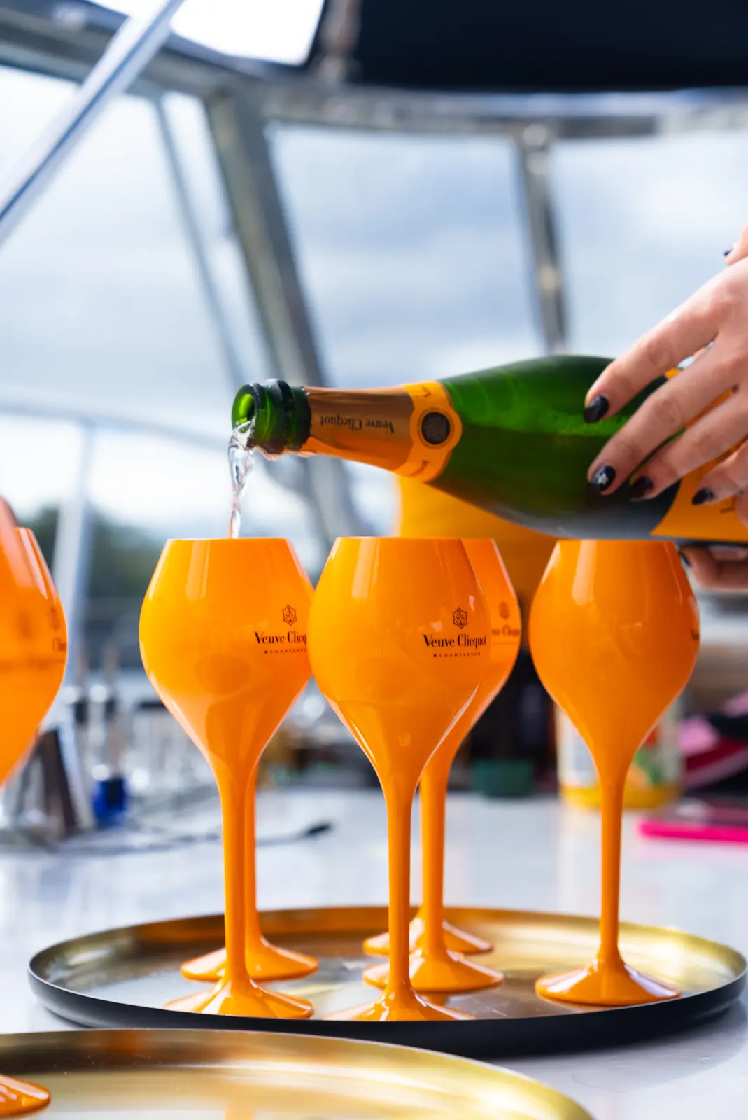 Champagne poured on deck to celebrate New Year’s Eve aboard Bote Charters