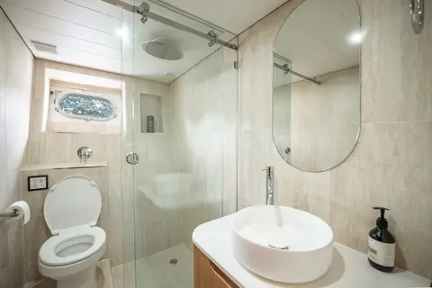 A marble ensuite bathroom on Bote Charters