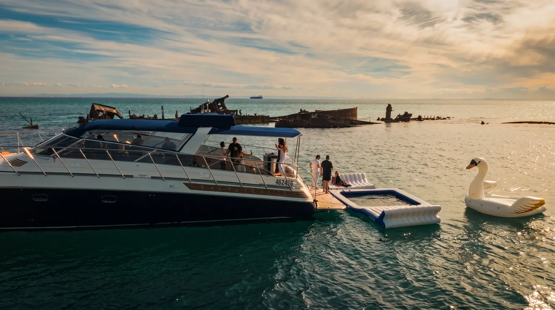 Guests on the deck of the Bote Charters yacht on Moreton Bay