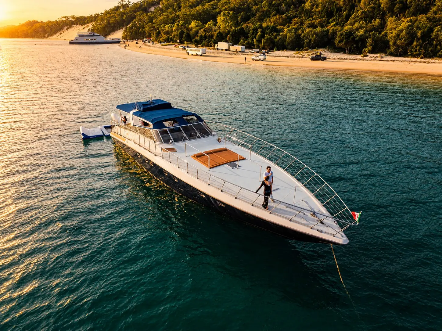 Brisbane city waterways lit up at night on a Bote charter